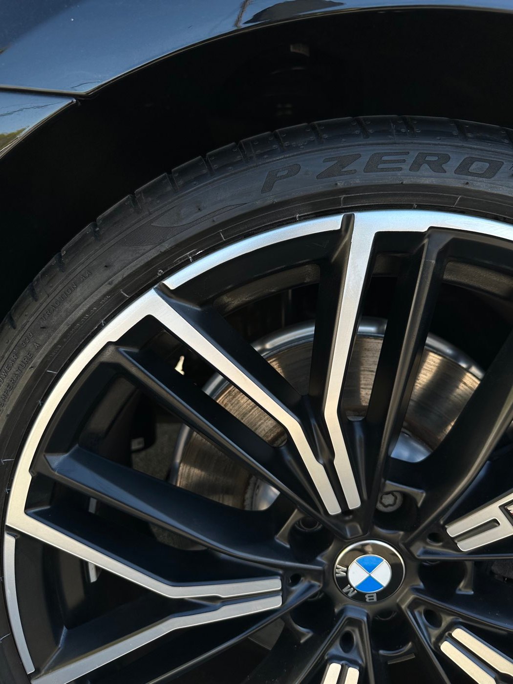 BMW alloy wheel after curb rash repair and refinish