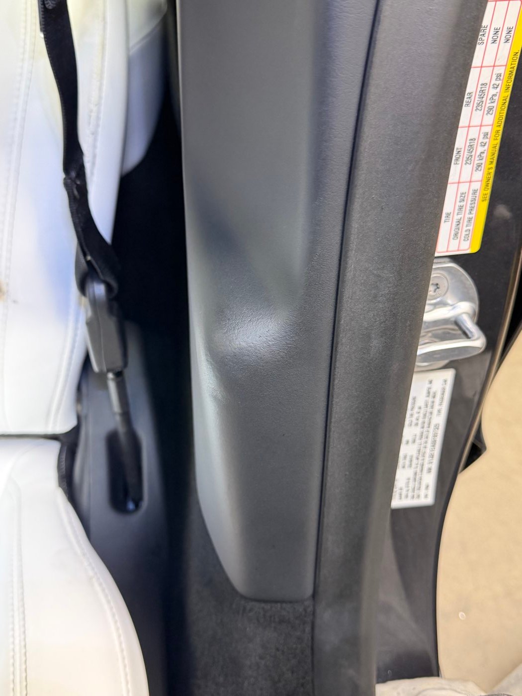 B-pillar trim after tear repair