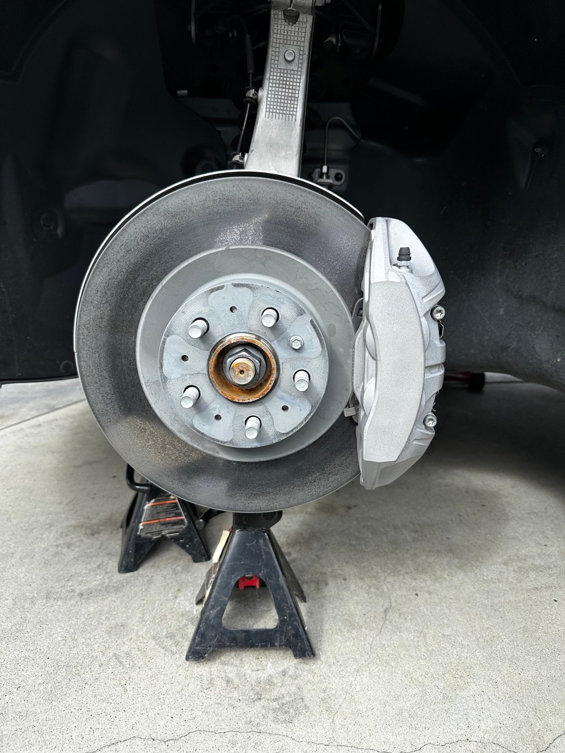 Tesla brake caliper before painting