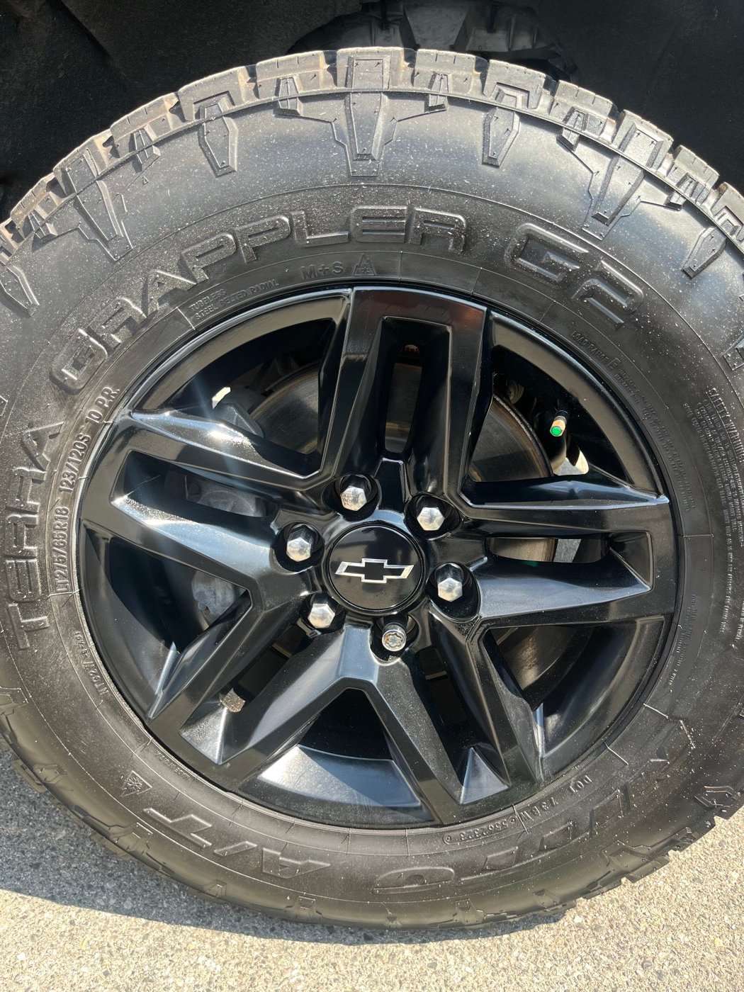 Chevy wheel after gloss black refinish
