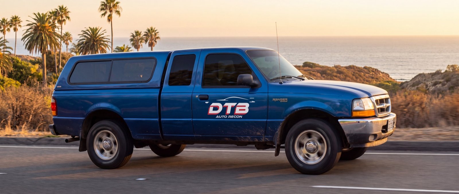 DTB Auto Recon mobile service truck driving the Orange County coast