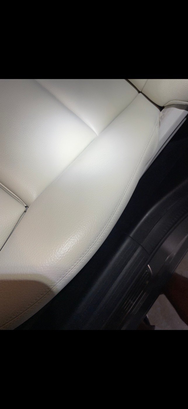 Cream leather seat after restoration