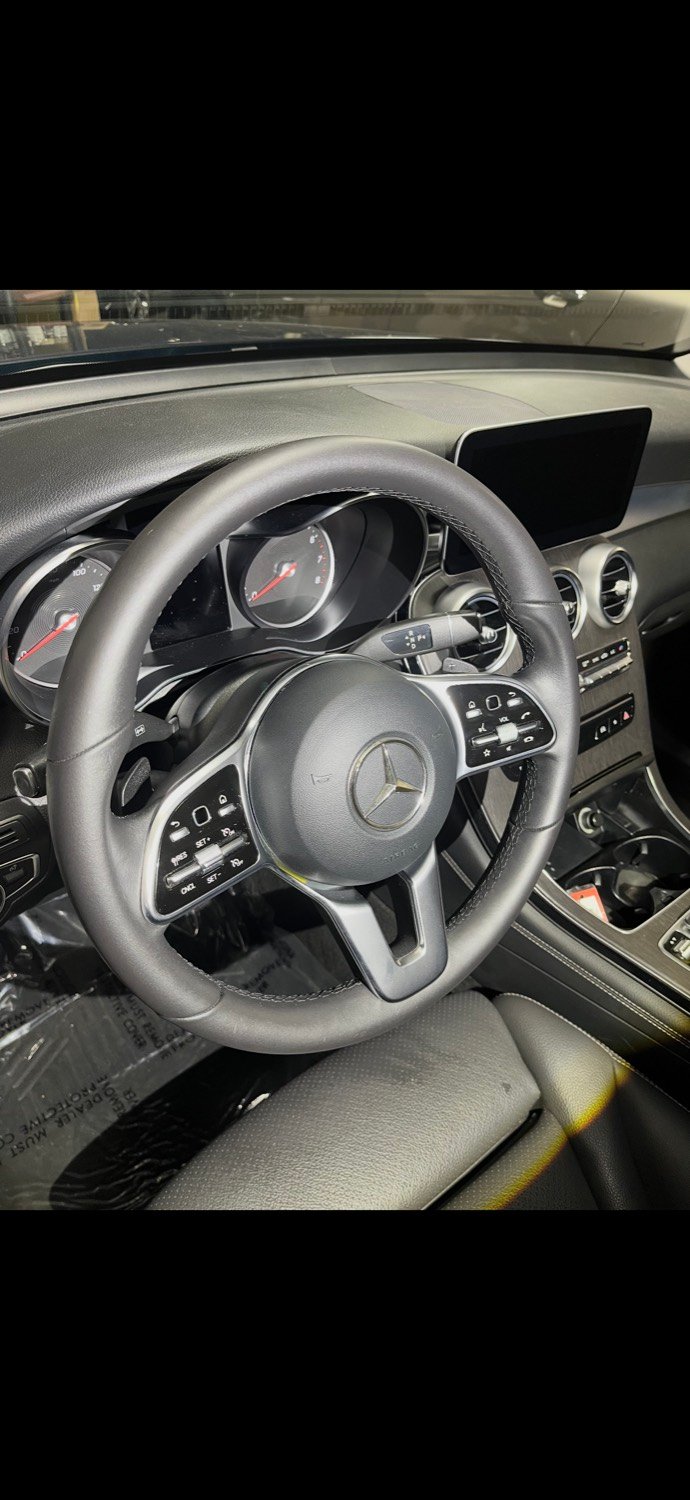 Mercedes steering wheel after leather reconditioning, installed in cabin